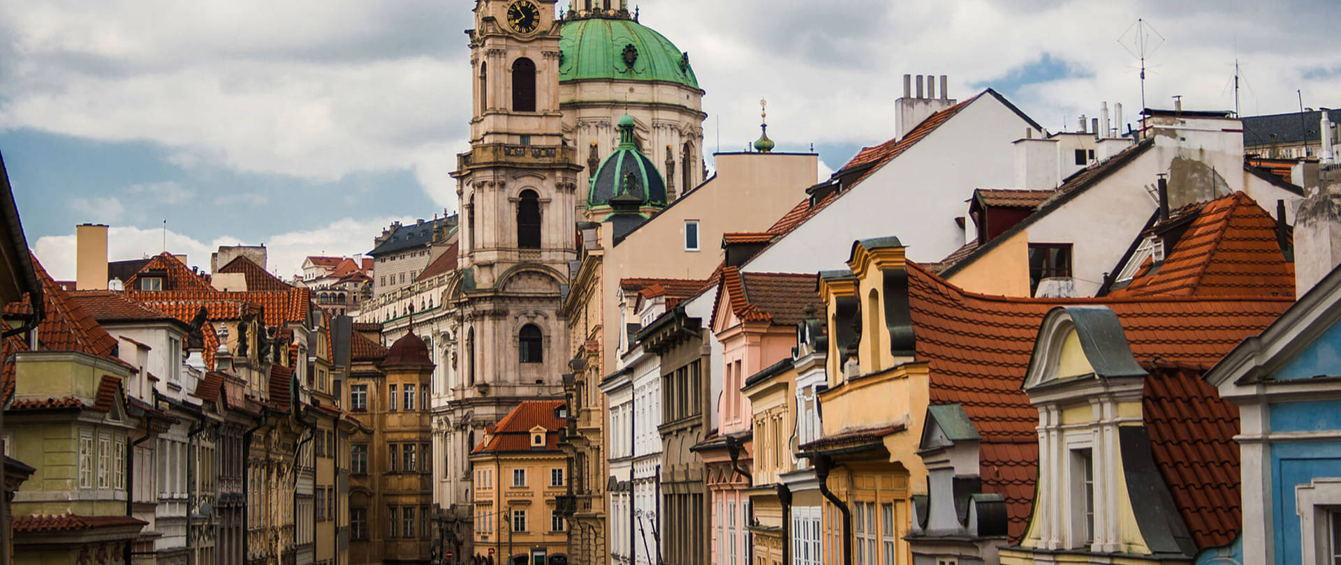 Enchanting Views of Old Prague Houses Wallpaper