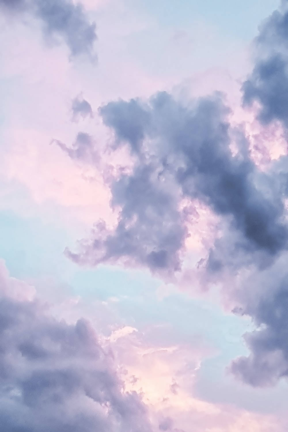 Pastel iPad Purple Clouds Wallpaper