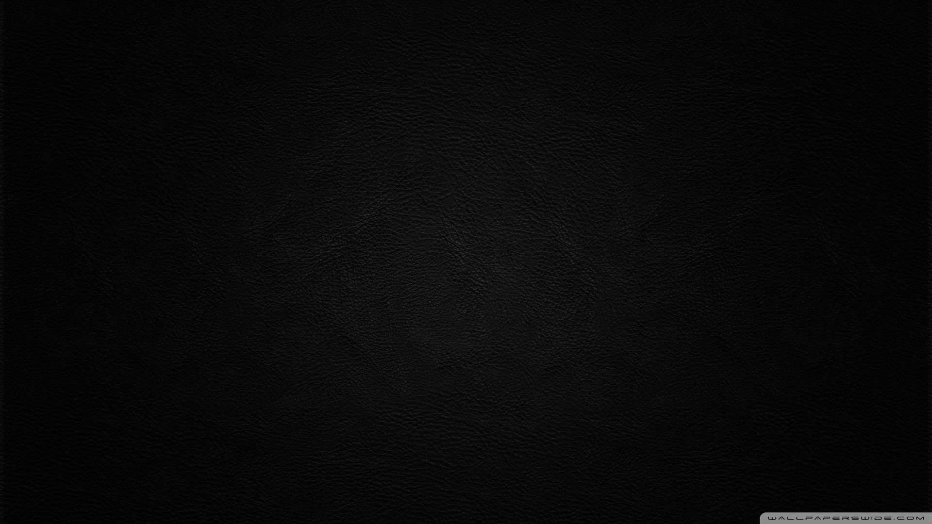 Sleek Pitch Black Leather Material Wallpaper