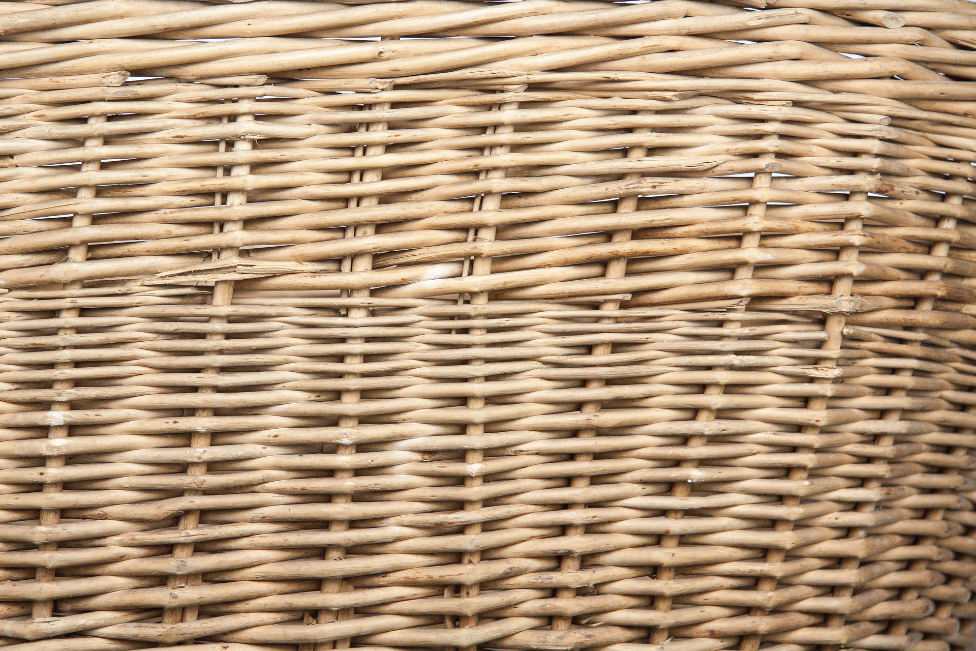 Intricately Handwoven Pliable Wicker Basket Wallpaper