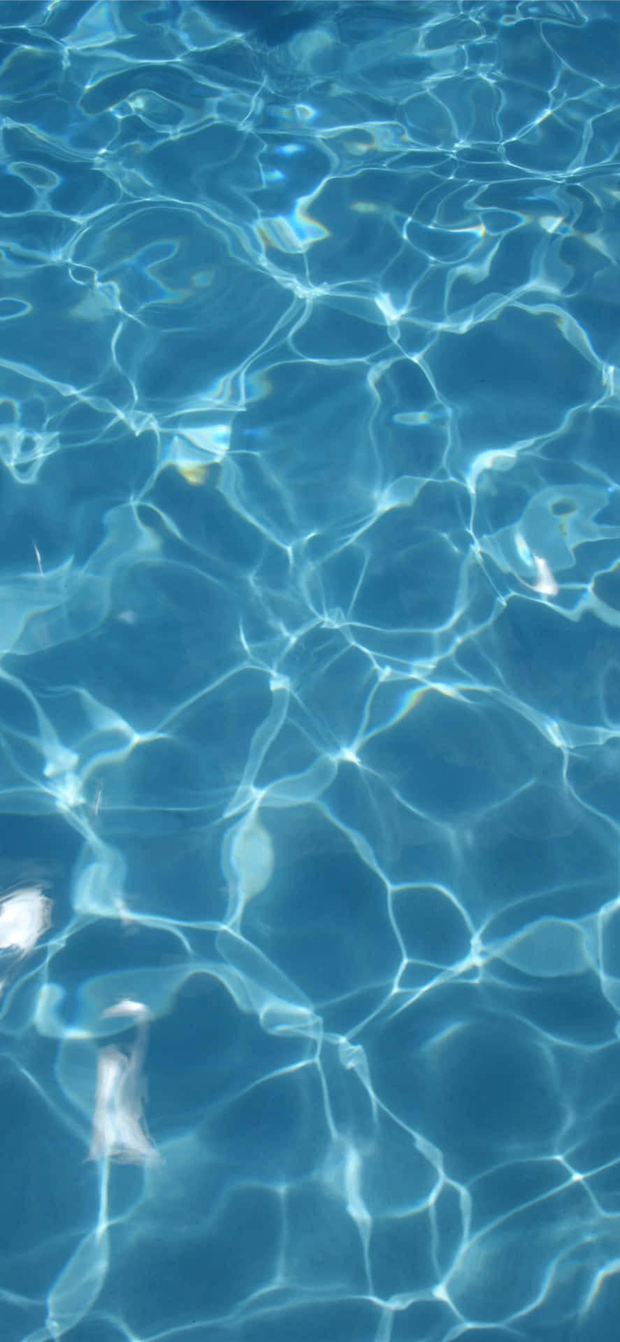 Caption: Pristine Radiant Blue Pool Water Wallpaper