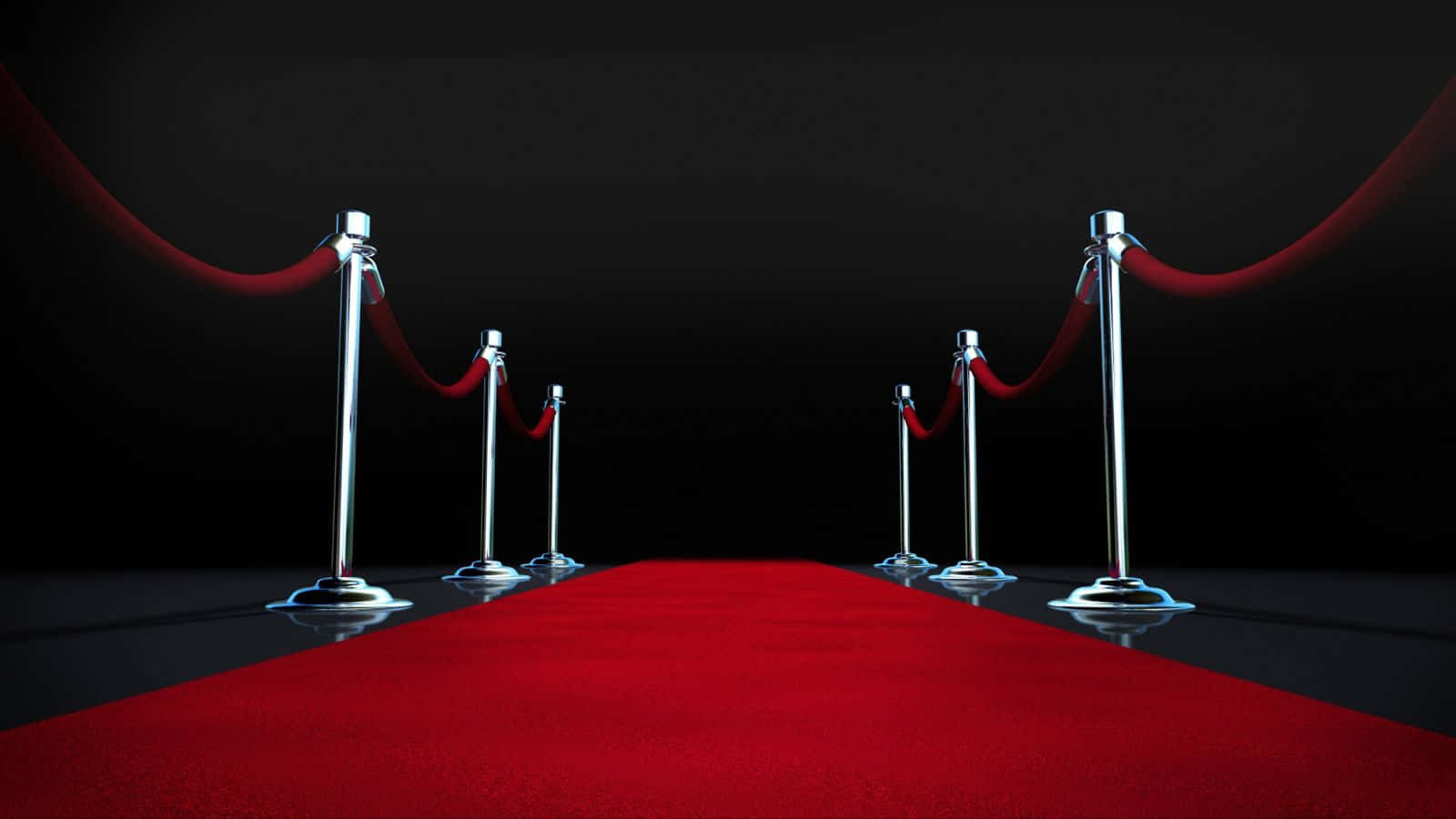 “Striking red carpet illuminated with dazzling lights”