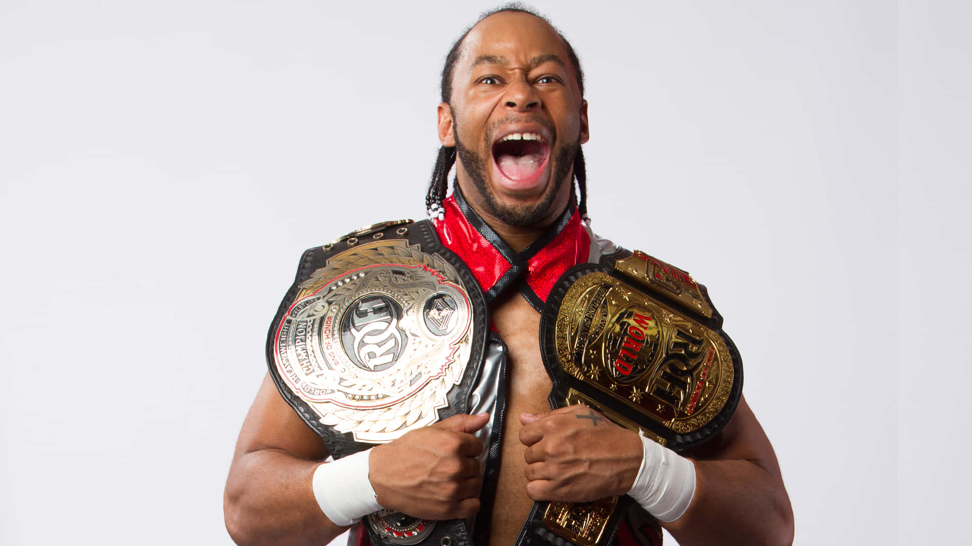 Champion Wrestler Jay Lethal Adorned with ROH Belts Wallpaper