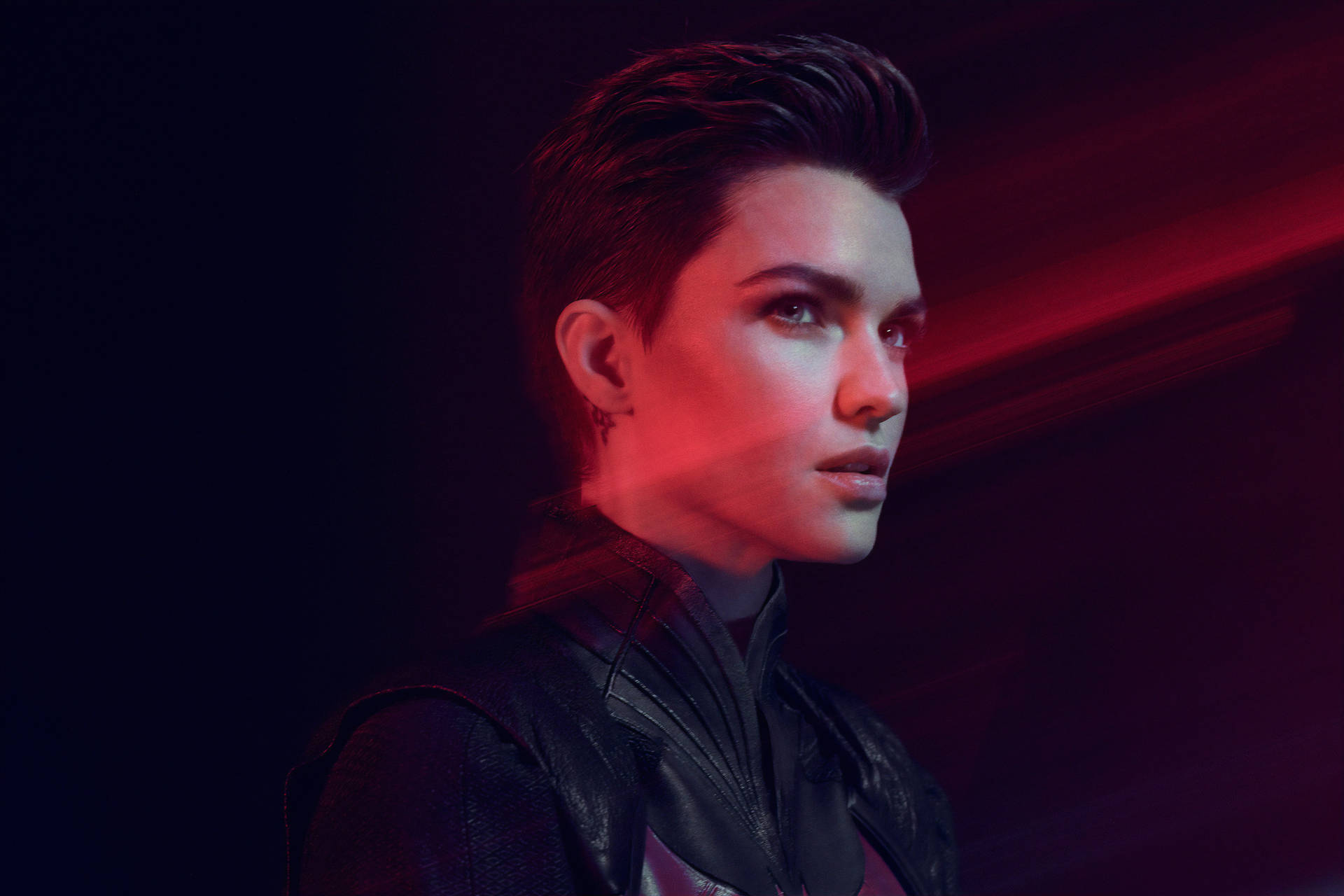 Caption: Ruby Rose showcasing her unique brushed-up hairstyle. Wallpaper