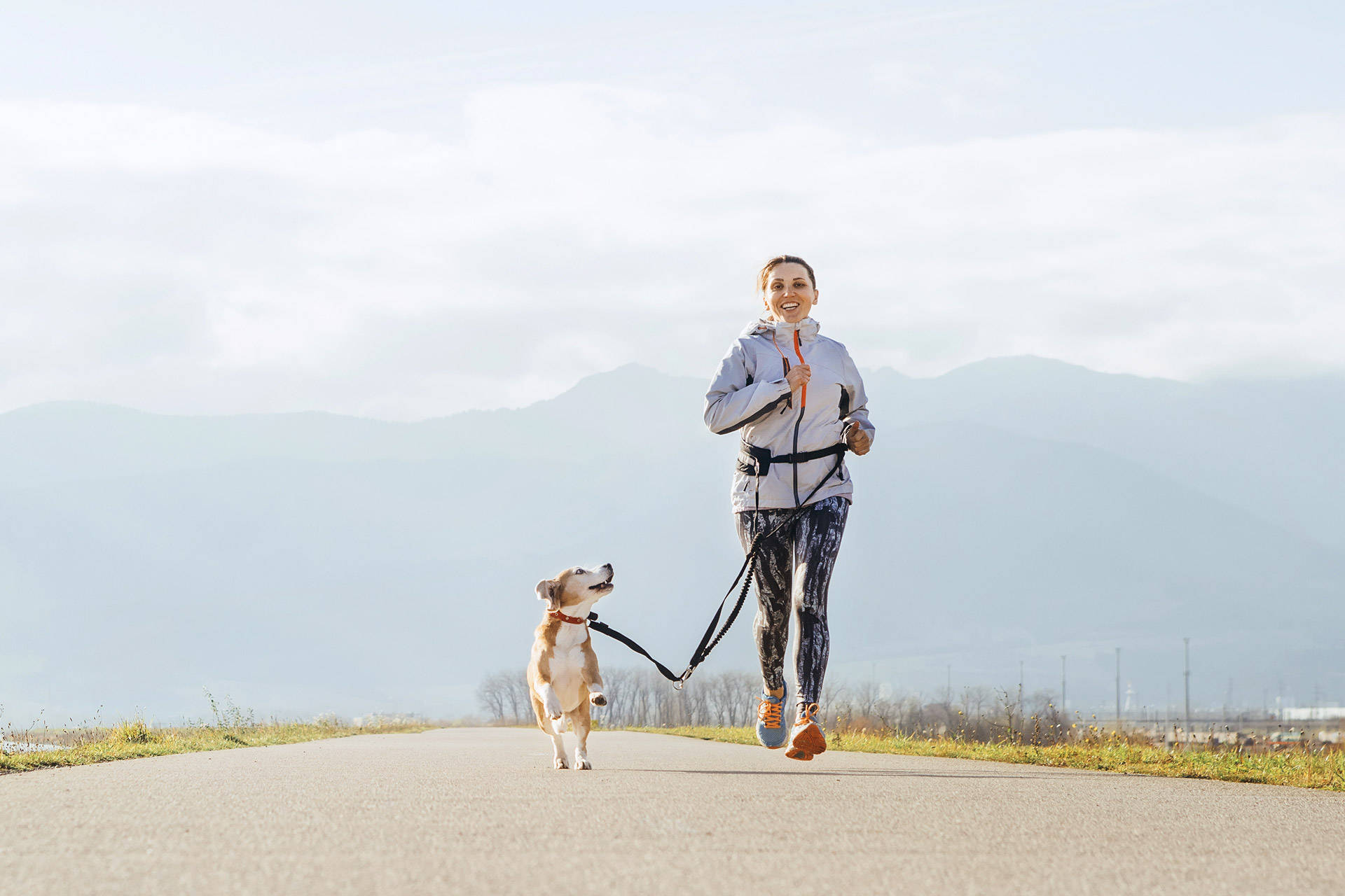 Running Woman With Dog Wallpaper