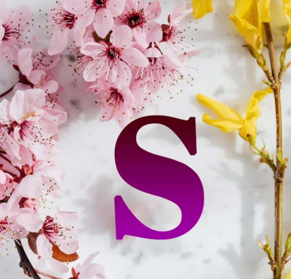 A White Background With Flowers And The Letter S