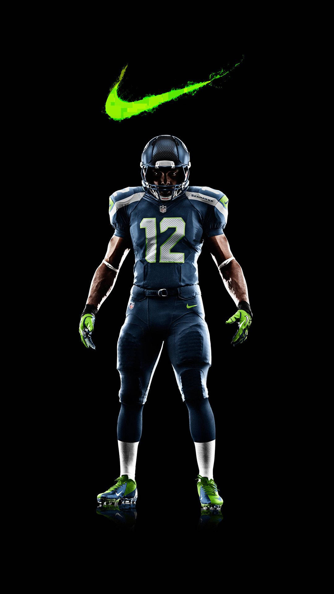 Unyielding determination: Seattle Seahawks Player in Action Wallpaper
