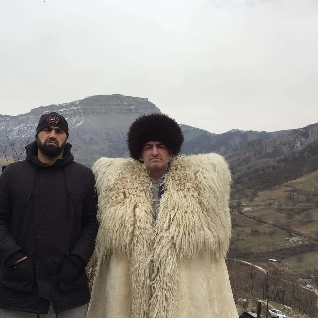 Shamil Abdurakhimov With Friend At A Mountain Wallpaper