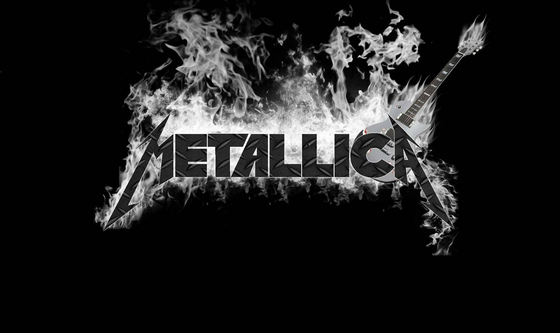 "Metallica's Iconic Logo Burns Bright in a Smokey Color Scheme" Wallpaper