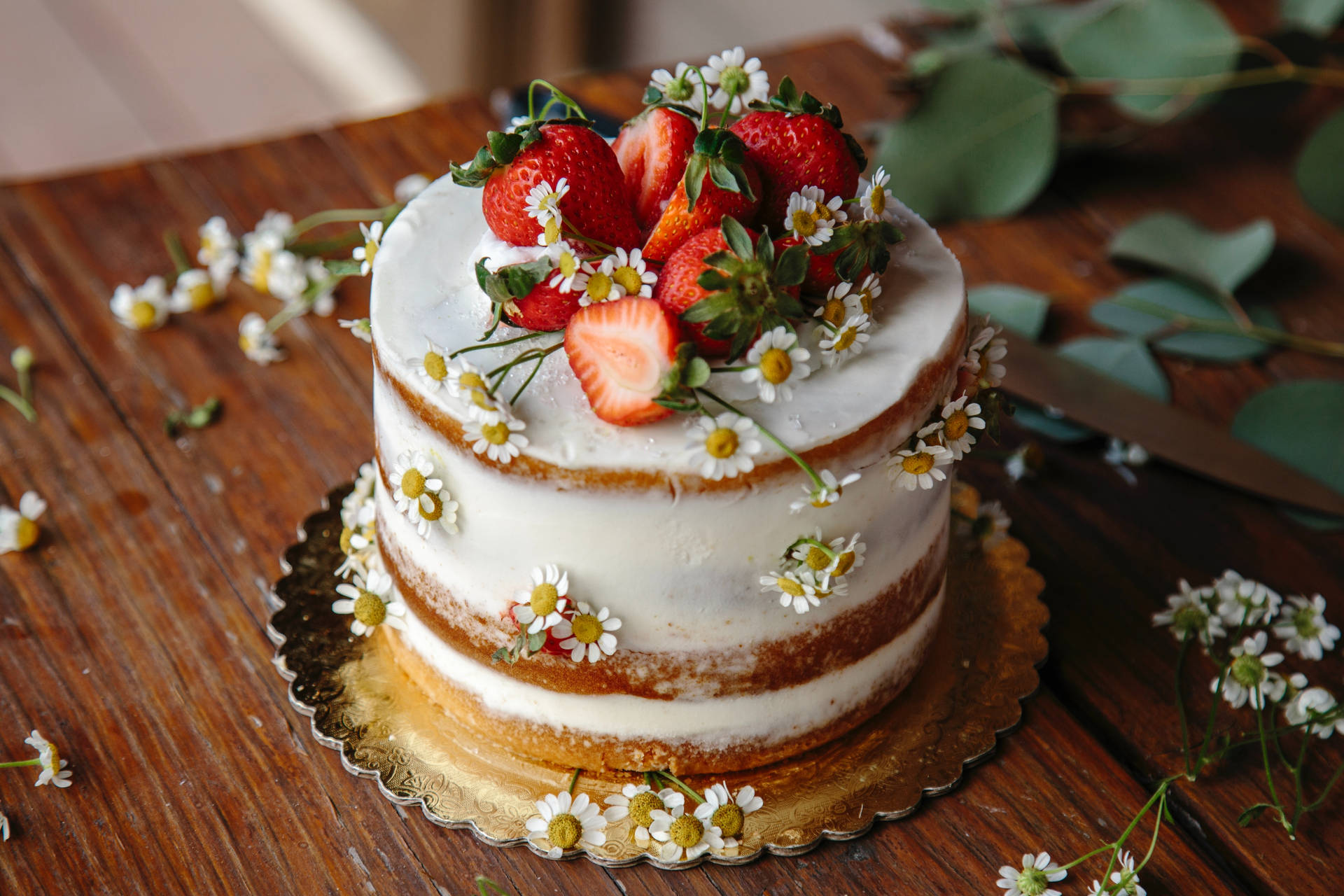 Delicious Strawberry and Flowers Decorated Cake Wallpaper
