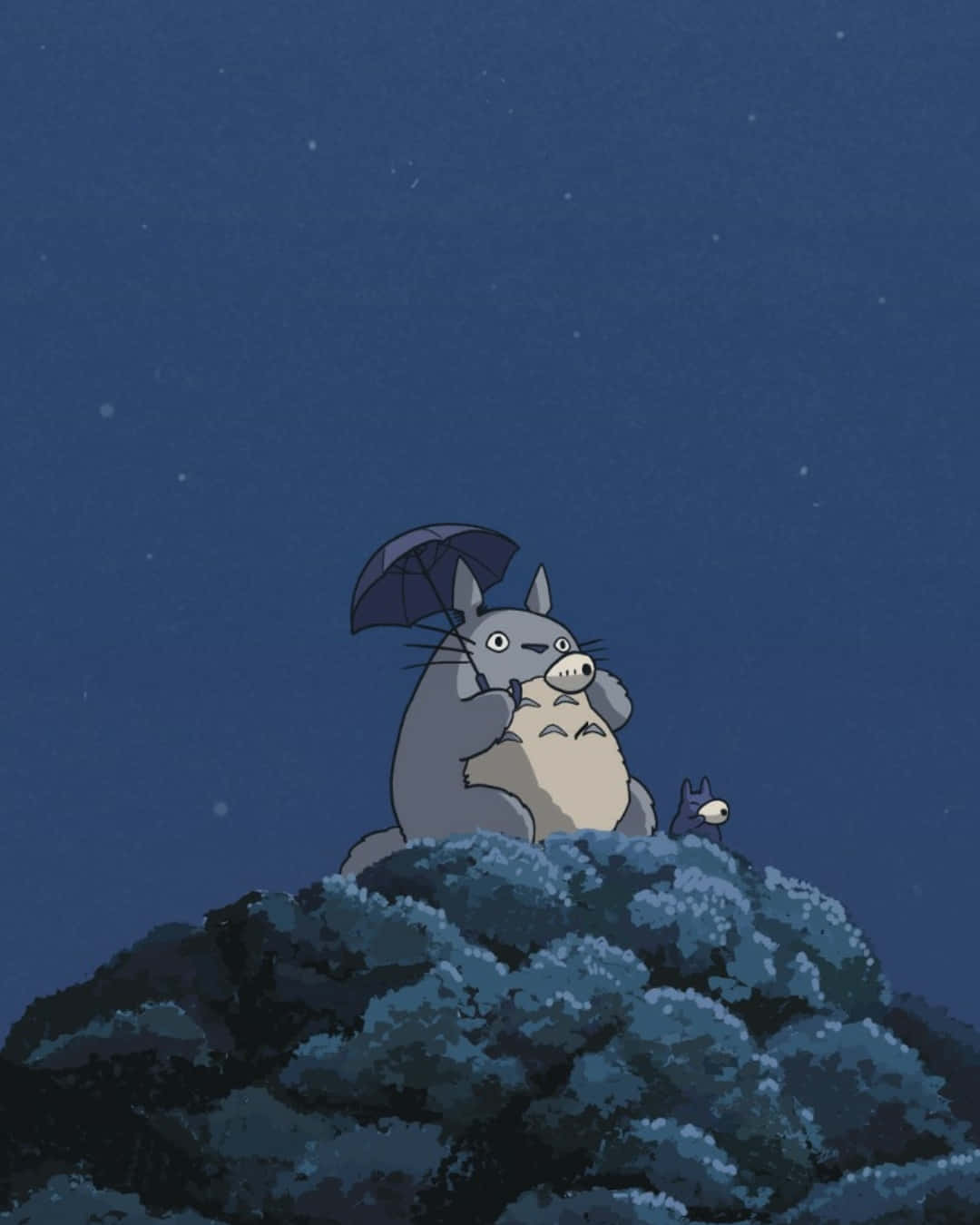 a totoro sitting on a rock with an umbrella Wallpaper