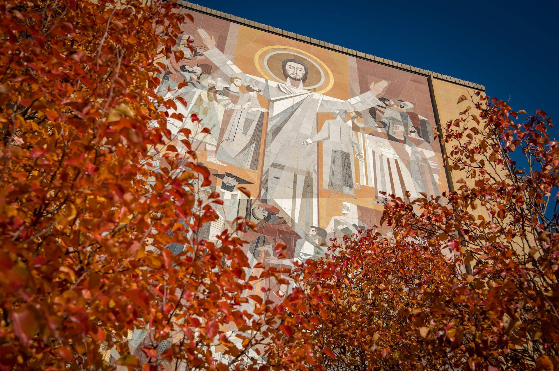 Caption: Iconic Touchdown Jesus Mural at the University of Notre Dame Wallpaper