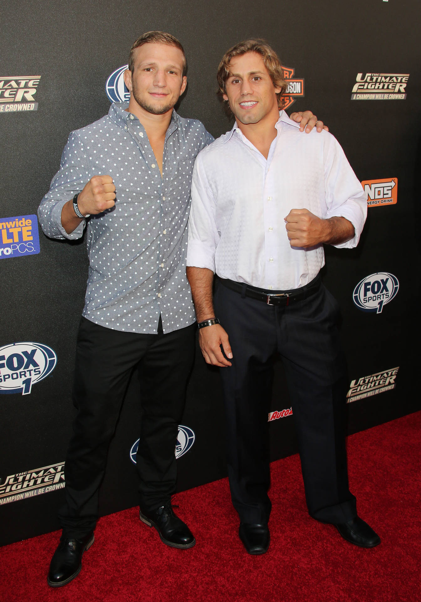 Urijah Faber and TJ Dillashaw during a mixed martial arts event. Wallpaper
