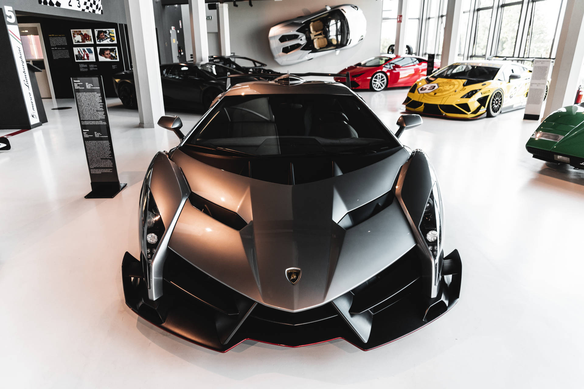 "Stunning Display of the Luxurious Veneno V12 at the Car Museum" Wallpaper