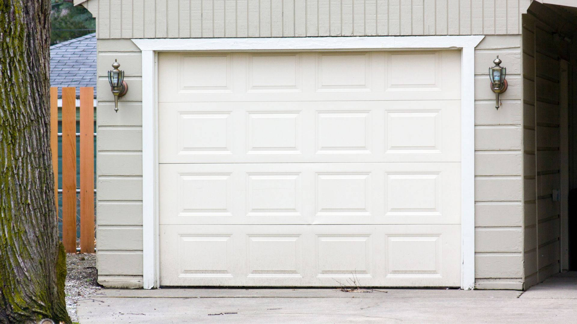 The aesthetic of a neat, closed garage door in white. Wallpaper
