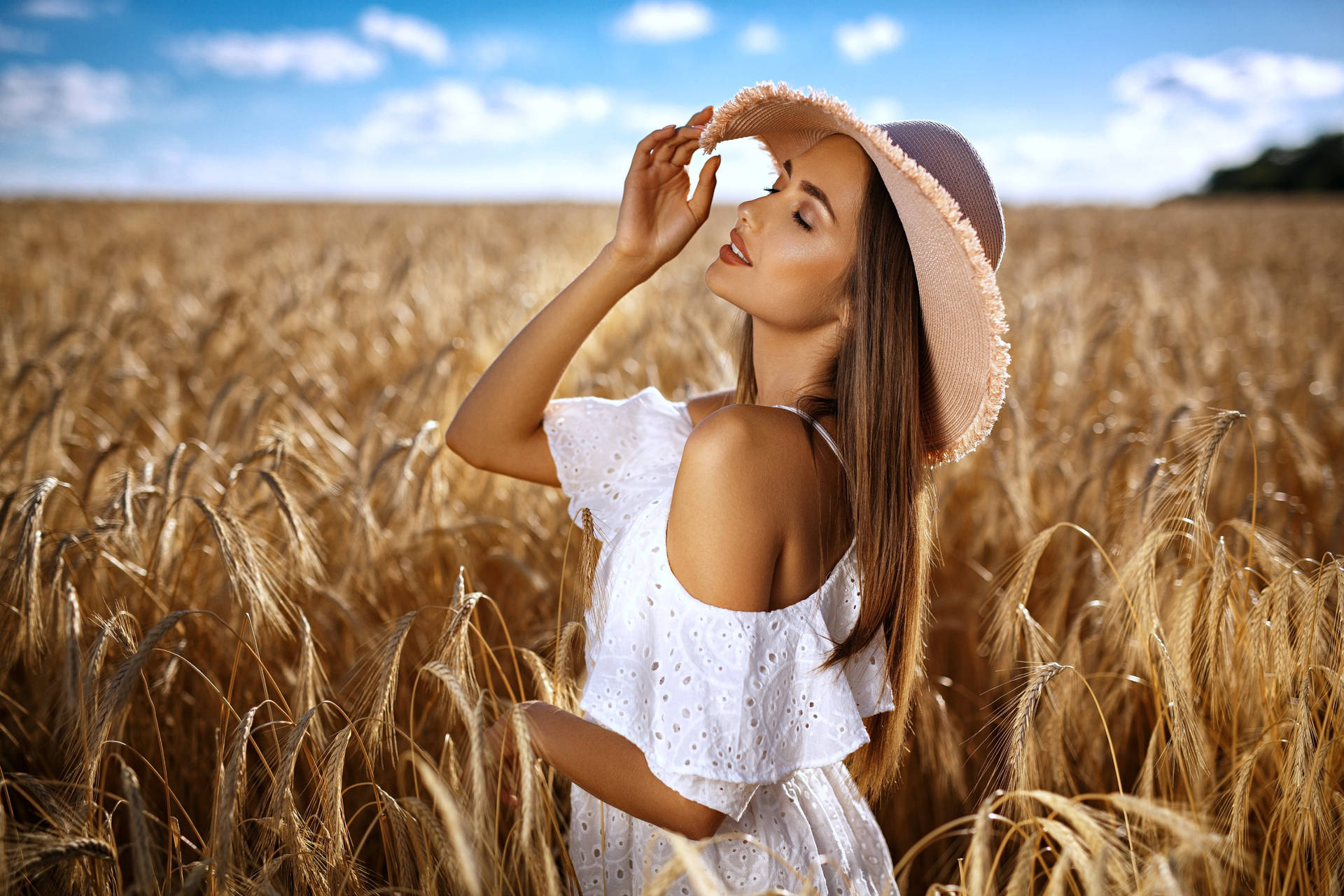 Serene Beauty in a Wheat Field Wallpaper