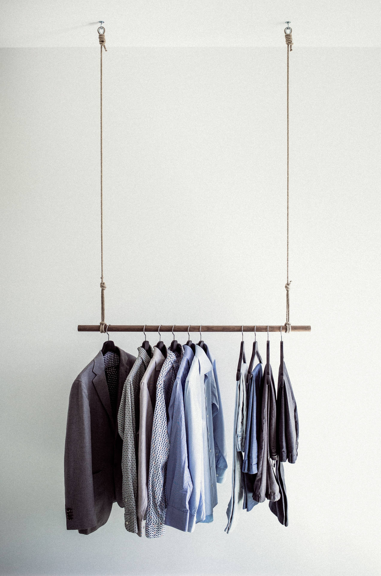 Wooden Hanging Clothes Rack Wallpaper