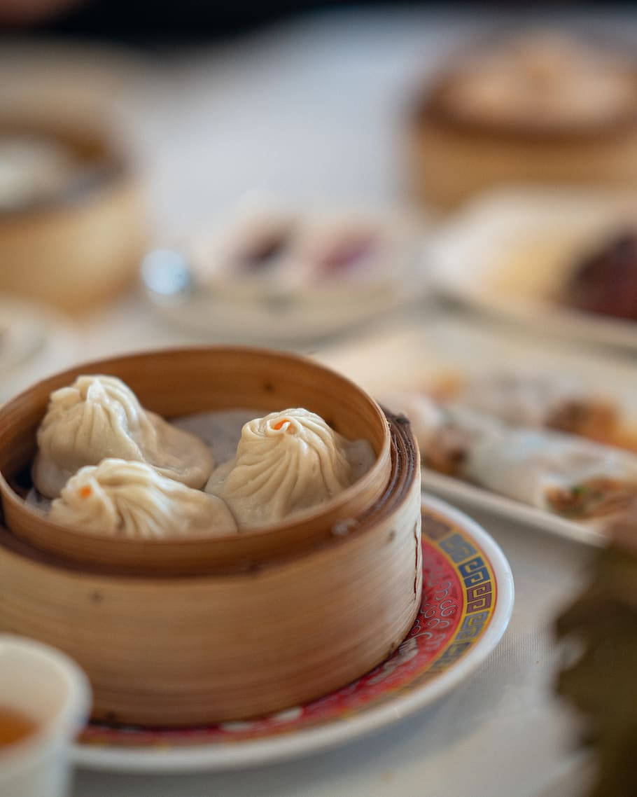 Captivating Steamy Xiaolongbao on Plate Wallpaper