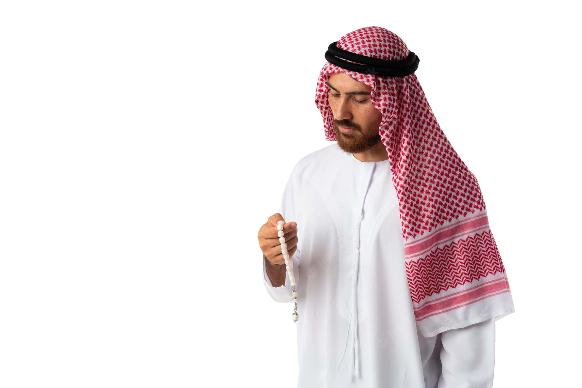 Young Arab Man Holding Beads Wallpaper