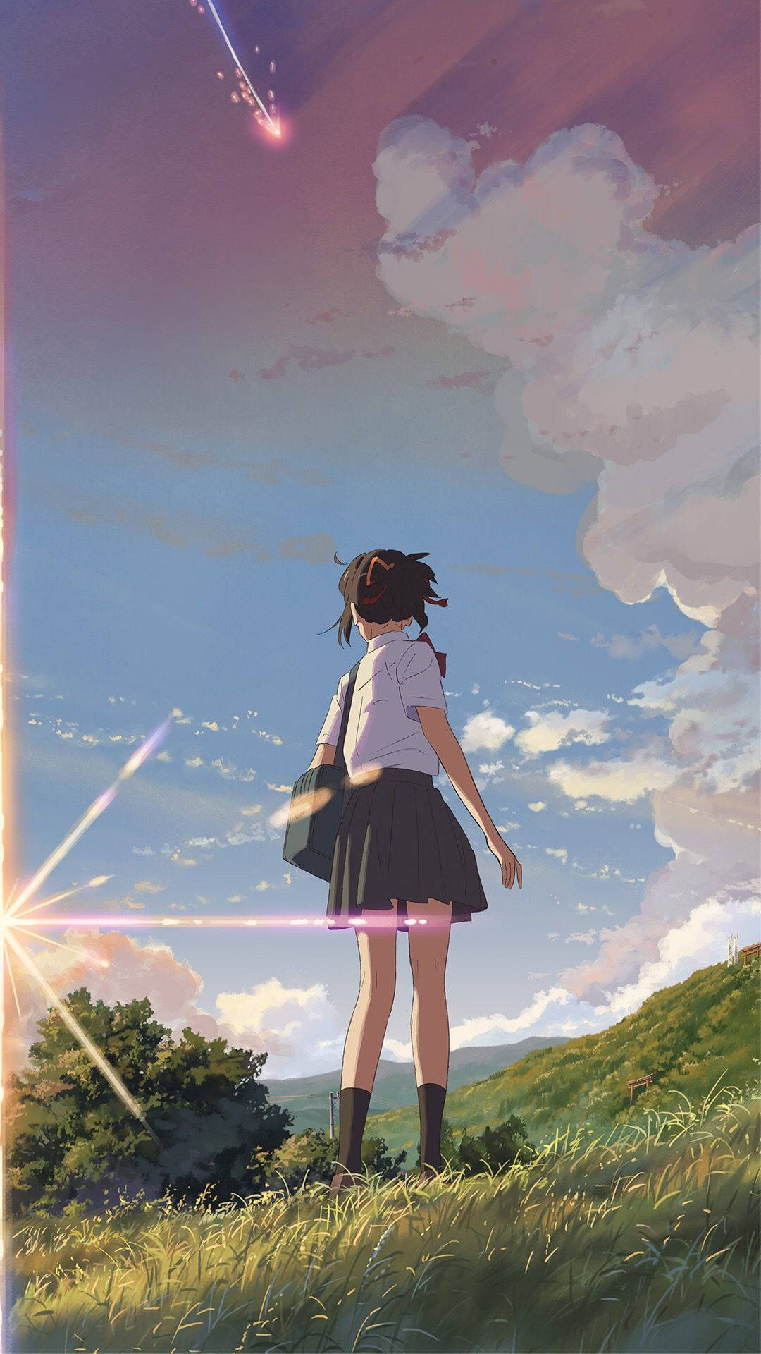 Mitsuha, the heroine of 'Your Name', admiring the beautiful field at sunset Wallpaper
